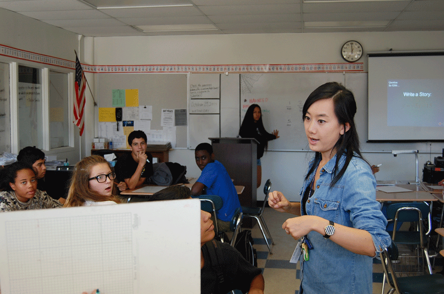 Katherine Fu works through a problem with her fifth period students.