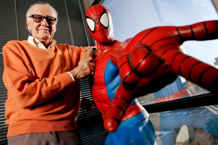 UNITED STATES - DECEMBER 18:  Stan Lee, founder of Marvel Entertainment Inc., poses next to a Spider-Man model in his office in Beverly Hills, California, U.S., in this file photo taken on Dec. 18, 2008. Walt Disney Co. agreed to buy Marvel Entertainment Inc. for about $4 billion in cash and stock in August 2009, adding comic-book characters Iron Man and Spider-Man to Disneys lineup of princesses and live-action stars.  (Photo by Jonathan Alcorn/Bloomberg via Getty Images)