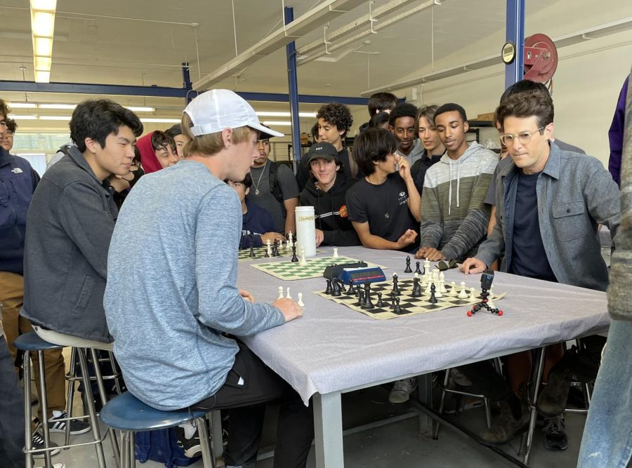 NBC+News+Correspondent+Jacob+Soboroff+and+CCHS+Chess+Club+President+Ian+Fogel+play+a+game+of+chess+for+the+segment%2C+which+was+broadcasted+Thursday+morning+on+May+18.+