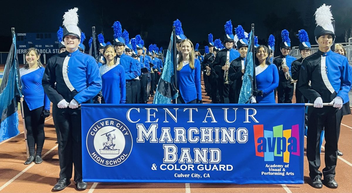 The Centaur Marching Band and Color Guard, led by Drum Majors Benji Corburn (left) and Aaryan Sharma (right)